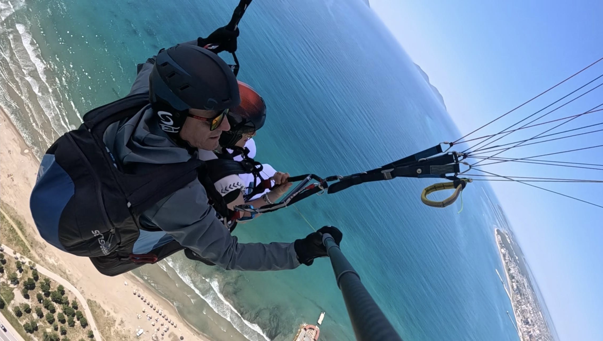Tandem paragliding over the Albanian coastline